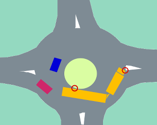 Truck with trailer in small roundabout